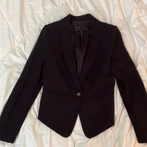 Black BCBG short blazer, size xs. Never worn.